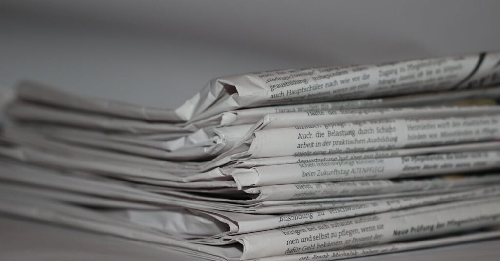 A close-up image of folded newspapers, perfect for news or journalism themes.